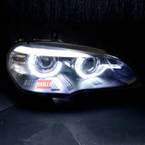 Dettaglio anelli Angel Eyes 3D LED dei fari anteriori BMW X5 E70