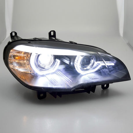 Coppia fari anteriori LED neri per BMW X5 E70 con fari Xenon di serie