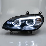 Fari anteriori Angel Eyes 3D LED neri per BMW X5 E70 con fari Xenon di serie